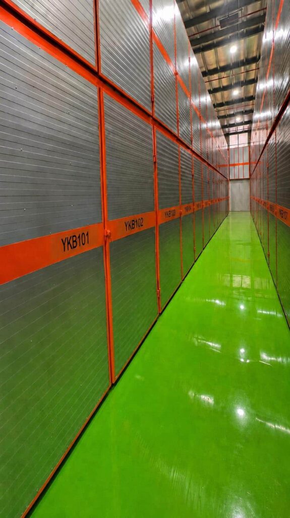 Indoor corridor of storage units at Green Storage Kibbutz Yakum